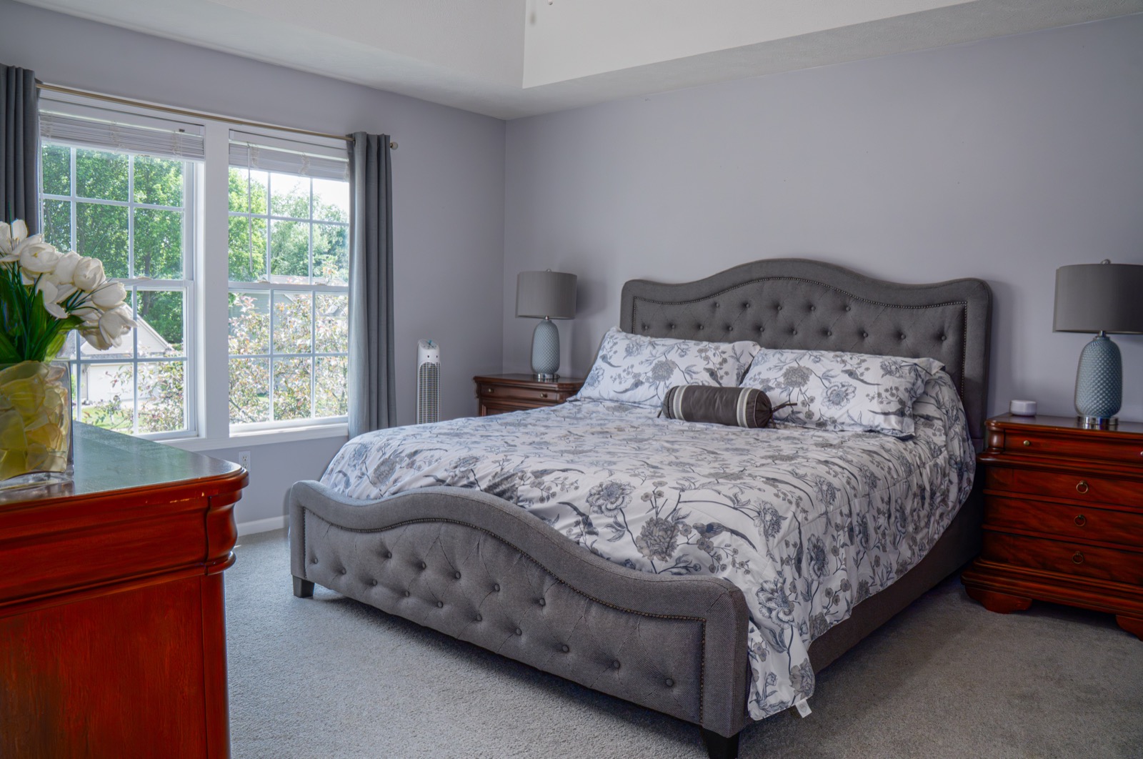 Primary bedroom with balanced window light