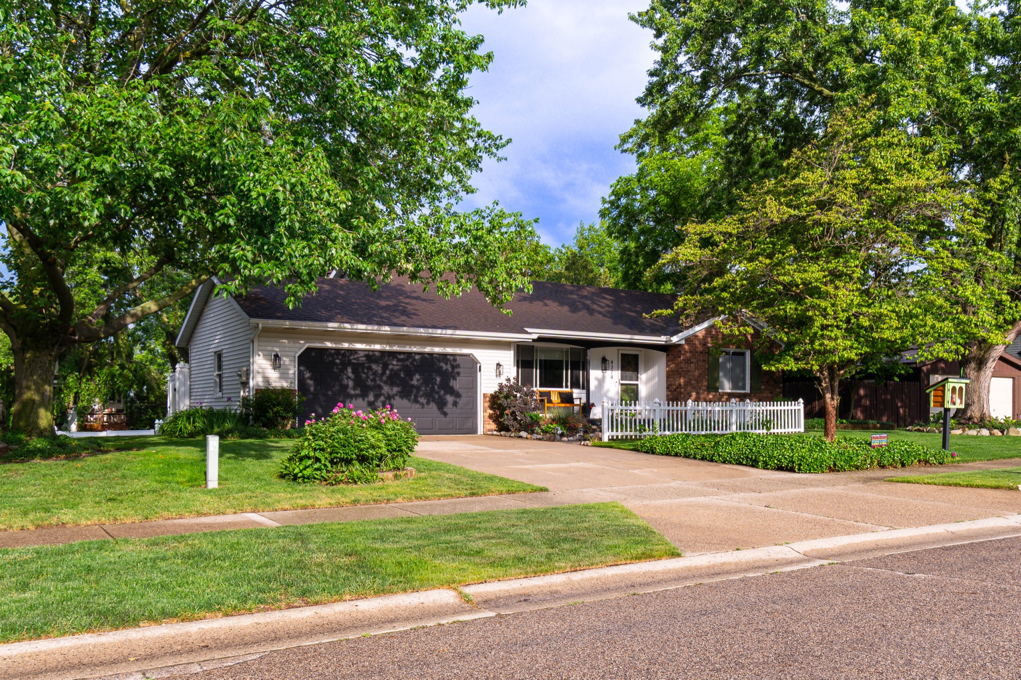 Front exterior of a West Michigan listing in crisp true-to-color HDR